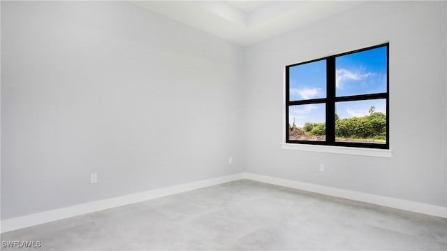 766 Naples Ave S, Lehigh Acres, FL 33974 - unfurnished room featuring finished concrete floors and baseboards