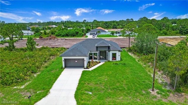 766 Naples Ave S, Lehigh Acres, FL 33974 - view of front of home featuring an attached garage, a front lawn, and concrete driveway