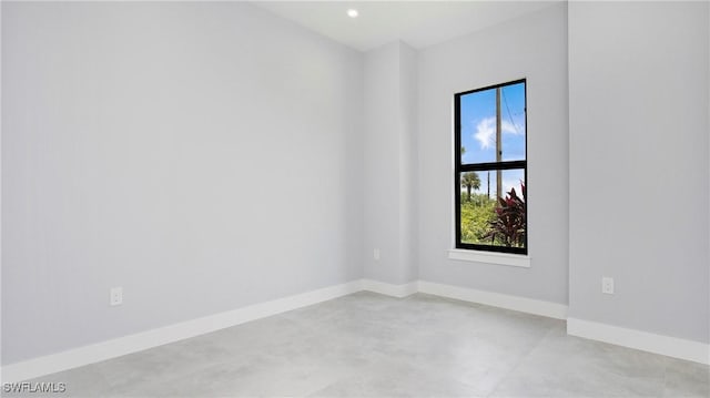 766 Naples Ave S, Lehigh Acres, FL 33974 - spare room with concrete floors and recessed lighting