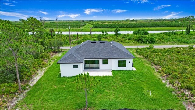 766 Naples Ave S, Lehigh Acres, FL 33974 - view from above of property with a nearby body of water