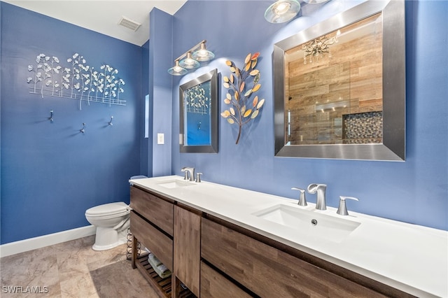 23204 Coconut Shores Dr, Estero, FL 34134 - bathroom with double vanity and toilet