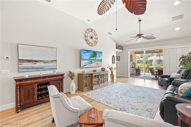 23204 Coconut Shores Dr, Estero, FL 34134 - living room with light wood-style flooring, a ceiling fan, recessed lighting, and high vaulted ceiling