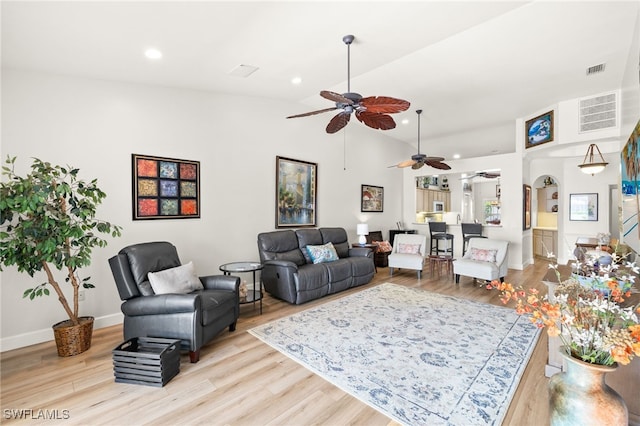 23204 Coconut Shores Dr, Estero, FL 34134 - living room featuring a ceiling fan, vaulted ceiling, light wood finished floors, and recessed lighting