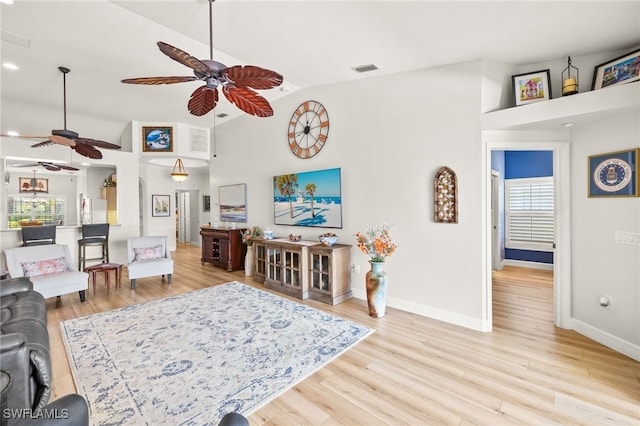 23204 Coconut Shores Dr, Estero, FL 34134 - living room featuring ceiling fan, light wood-style flooring, vaulted ceiling, and recessed lighting