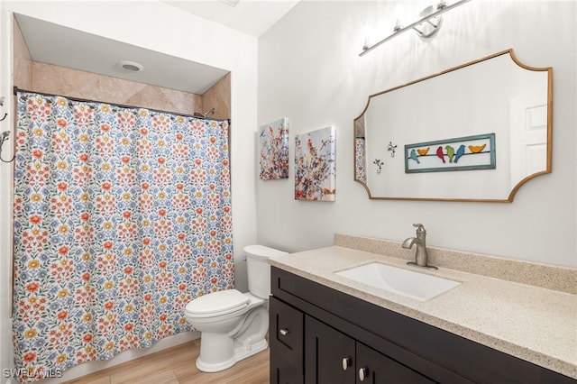 23204 Coconut Shores Dr, Estero, FL 34134 - full bathroom featuring vanity, wood finished floors, and a shower with curtain