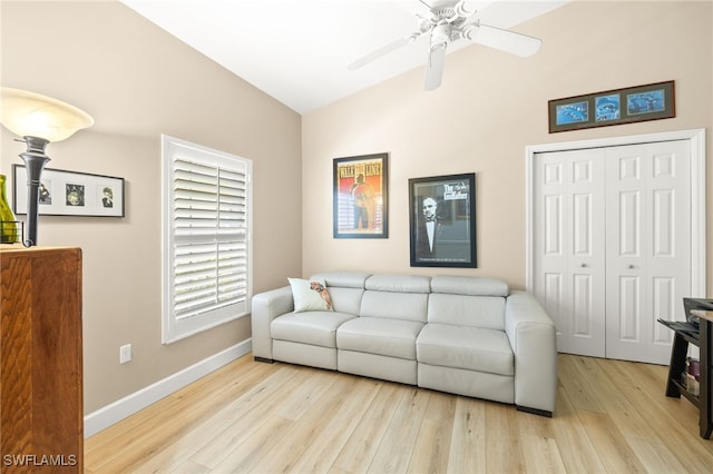 23204 Coconut Shores Dr, Estero, FL 34134 - living room with vaulted ceiling, wood finished floors, and a ceiling fan