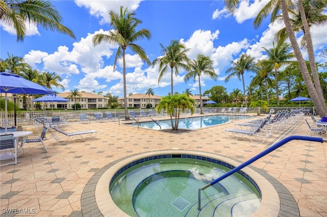 23204 Coconut Shores Dr, Estero, FL 34134 - community pool with a hot tub and a patio area