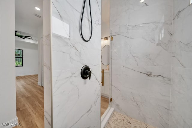 1517 Washington Ave, Lehigh Acres, FL 33972 - full bath featuring a marble finish shower and wood finished floors