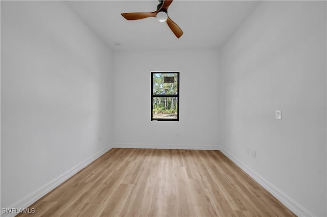 1517 Washington Ave, Lehigh Acres, FL 33972 - empty room featuring light wood-type flooring and a ceiling fan