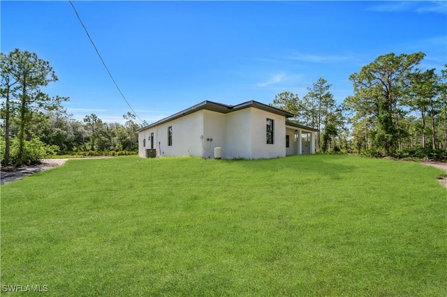 1517 Washington Ave, Lehigh Acres, FL 33972 - view of grassy yard