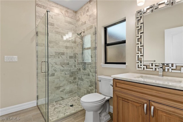 1701 Casey Key Dr, Punta Gorda, FL 33950 - bathroom with vanity, a stall shower, and wood finished floors