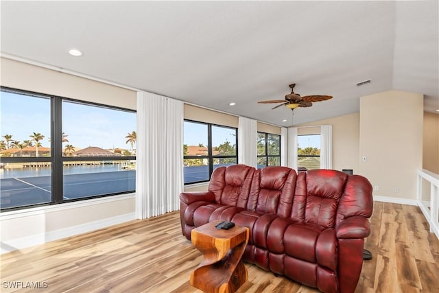 1701 Casey Key Dr, Punta Gorda, FL 33950 - living room with wood finished floors, a ceiling fan, vaulted ceiling, and recessed lighting