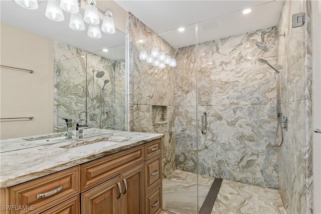 1701 Casey Key Dr, Punta Gorda, FL 33950 - bathroom featuring vanity, a marble finish shower, marble finish flooring, and recessed lighting