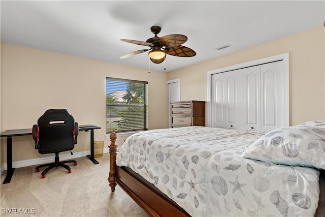 1701 Casey Key Dr, Punta Gorda, FL 33950 - bedroom featuring light colored carpet, two closets, and a ceiling fan