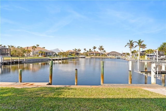 1701 Casey Key Dr, Punta Gorda, FL 33950 - dock area with a residential view, a water view, and a lawn