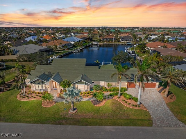 1701 Casey Key Dr, Punta Gorda, FL 33950 - aerial view at dusk of a water view and a residential view