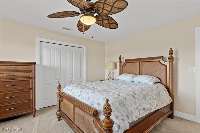 1701 Casey Key Dr, Punta Gorda, FL 33950 - bedroom featuring light carpet, a closet, and ceiling fan