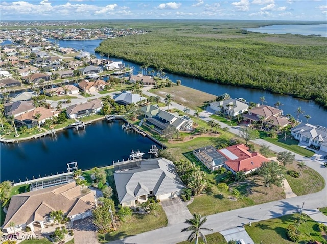 1701 Casey Key Dr, Punta Gorda, FL 33950 - aerial view of property and surrounding area featuring a large body of water and nearby suburban area