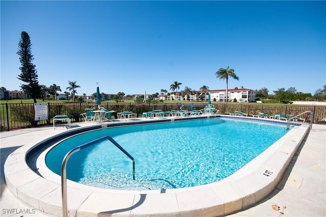 21 High Point Cir E Unit 308, Naples, FL 34103 - community pool with a patio area