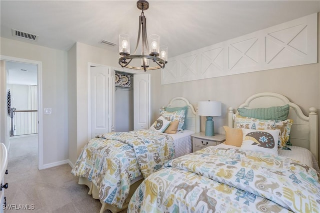 10451 Mineral Ct, North Fort Myers, FL 33917 - carpeted bedroom with a closet and a chandelier
