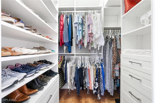 4945 Cougar Ct S Unit 4-202, Naples, FL 34109 - spacious closet featuring wood finished floors
