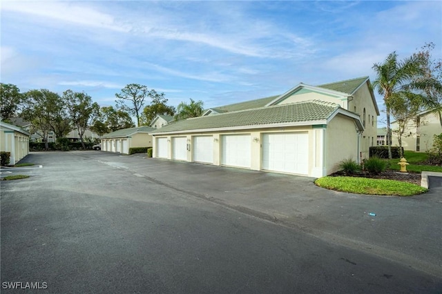 4945 Cougar Ct S Unit 4-202, Naples, FL 34109 - view of garage