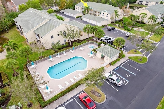 4945 Cougar Ct S Unit 4-202, Naples, FL 34109 - drone / aerial view of a pool area