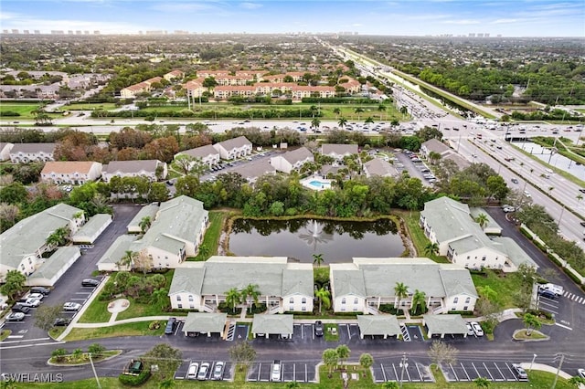 4945 Cougar Ct S Unit 4-202, Naples, FL 34109 - aerial overview of property's location with a nearby body of water and nearby suburban area