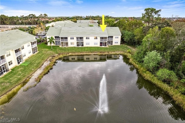 4945 Cougar Ct S Unit 4-202, Naples, FL 34109 - bird's eye view of a nearby body of water and a tree filled landscape