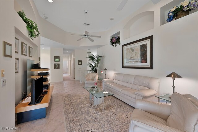 26962 Montego Pointe Ct Unit 202, Bonita Springs, FL 34134 - living room featuring light tile patterned floors, a ceiling fan, recessed lighting, and a towering ceiling