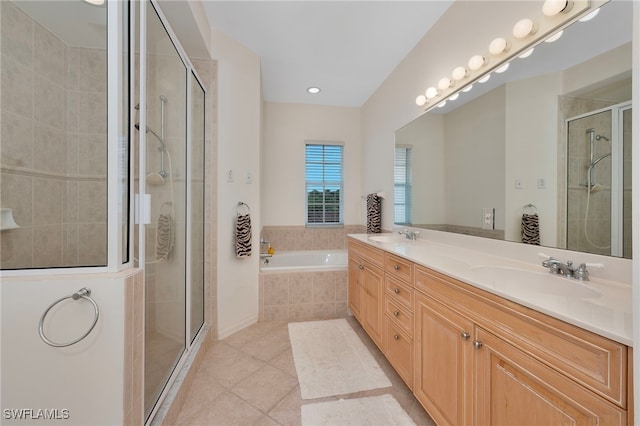 26962 Montego Pointe Ct Unit 202, Bonita Springs, FL 34134 - bathroom featuring tile patterned floors, a bath, double vanity, a shower stall, and recessed lighting