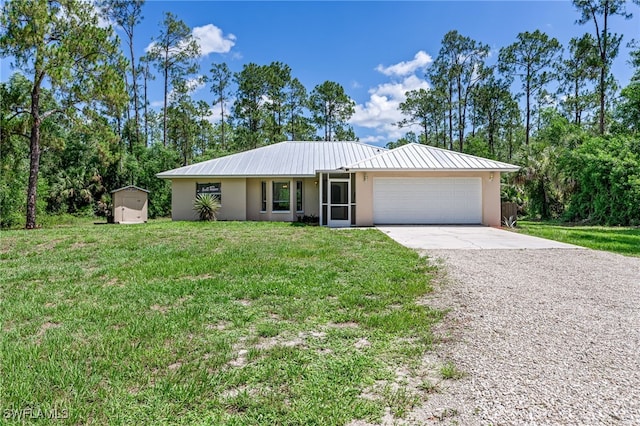 3191 Golden Gate Blvd E, Naples, FL 34120 - single story home with stucco siding, driveway, a storage unit, an attached garage, and a front yard