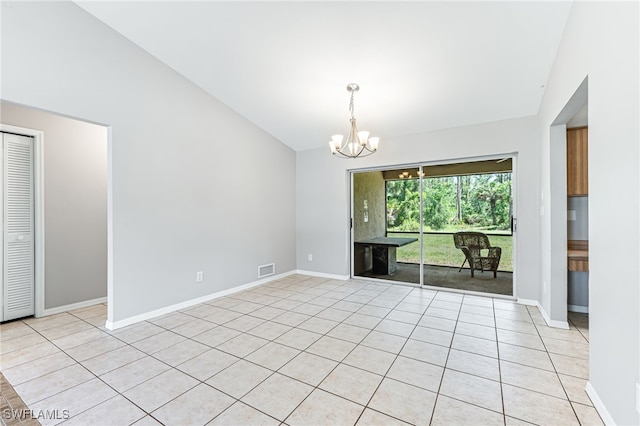 3191 Golden Gate Blvd E, Naples, FL 34120 - spare room featuring a chandelier, vaulted ceiling, and light tile patterned floors