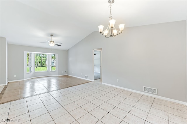 3191 Golden Gate Blvd E, Naples, FL 34120 - spare room featuring light tile patterned floors, a chandelier, a ceiling fan, and vaulted ceiling