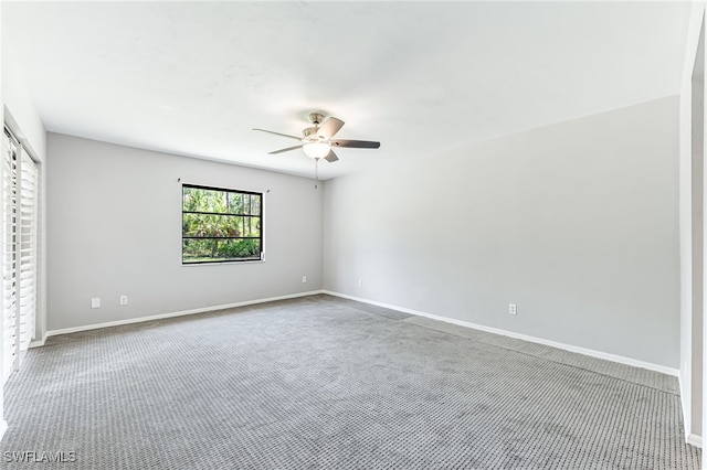 3191 Golden Gate Blvd E, Naples, FL 34120 - unfurnished bedroom with carpet and a ceiling fan