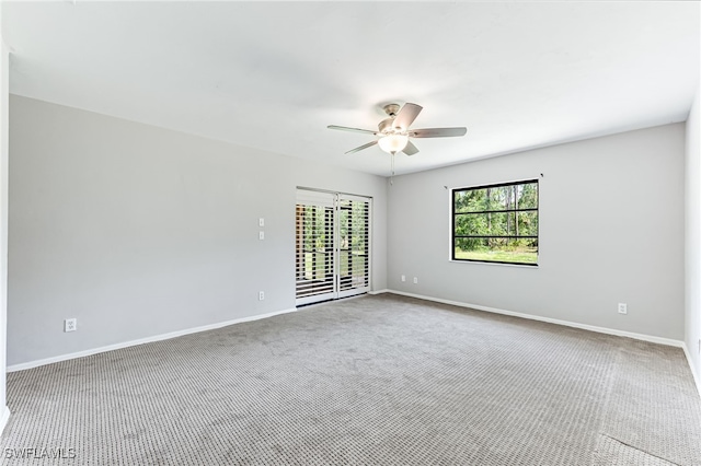 3191 Golden Gate Blvd E, Naples, FL 34120 - unfurnished room with carpet floors and ceiling fan