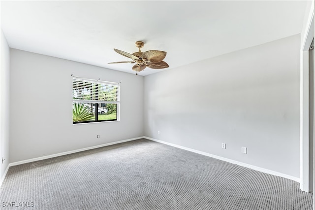3191 Golden Gate Blvd E, Naples, FL 34120 - empty room featuring carpet and a ceiling fan