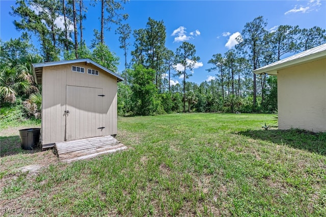 3191 Golden Gate Blvd E, Naples, FL 34120 - view of green lawn with a shed