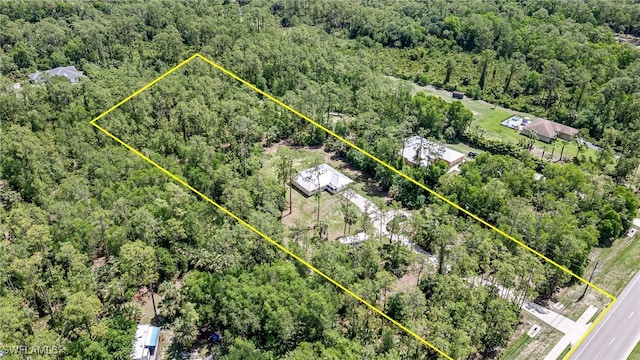 3191 Golden Gate Blvd E, Naples, FL 34120 - view of property location with a heavily wooded area and property parcel outlined