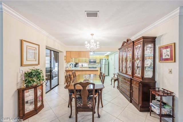 1021 Charlemagne Blvd, Naples, FL 34112 - dining room featuring a chandelier, crown molding, and light tile patterned floors
