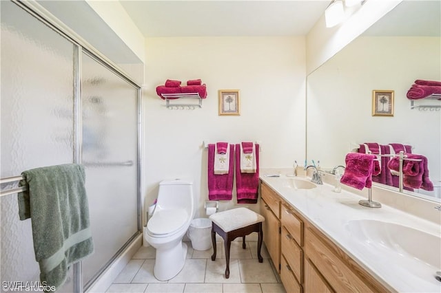 1021 Charlemagne Blvd, Naples, FL 34112 - bathroom featuring a shower stall, tile patterned flooring, and double vanity