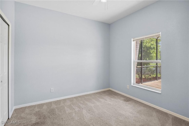 1023 SE 6th St, Cape Coral, FL 33990 - carpeted empty room featuring baseboards and ceiling fan