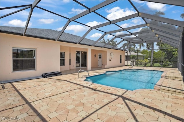 1023 SE 6th St, Cape Coral, FL 33990 - outdoor pool with a patio area and glass enclosure
