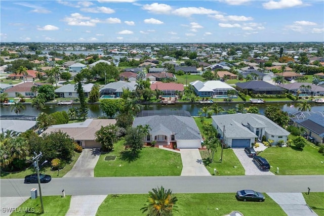 1023 SE 6th St, Cape Coral, FL 33990 - aerial perspective of suburban area featuring a large body of water