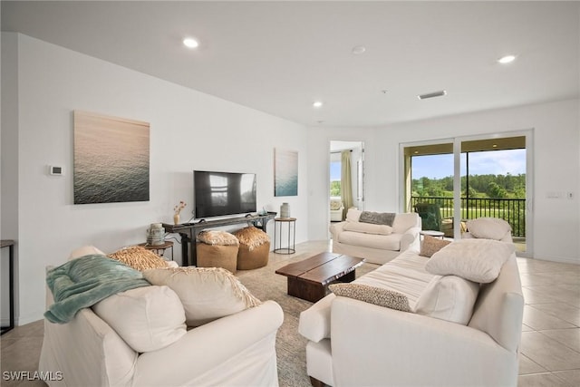 15887 Grassland Ln Unit 4622, Punta Gorda, FL 33982 - living room with recessed lighting and light tile patterned floors