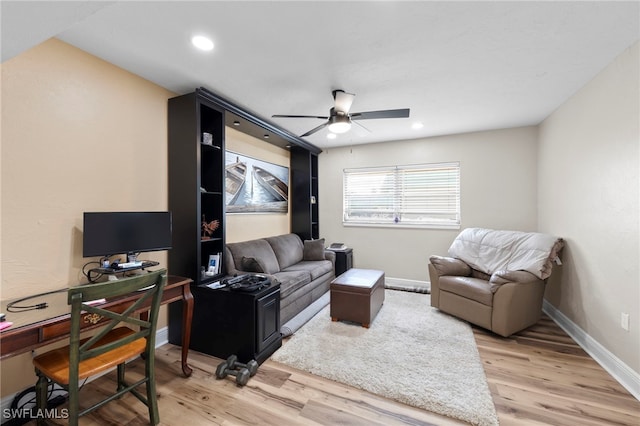 4938 Vincennes St Unit 3, Cape Coral, FL 33904 - living room featuring a ceiling fan, a desk, light wood-style floors, and recessed lighting