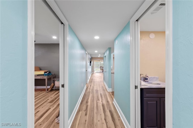 4938 Vincennes St Unit 3, Cape Coral, FL 33904 - hallway featuring light wood-type flooring and recessed lighting
