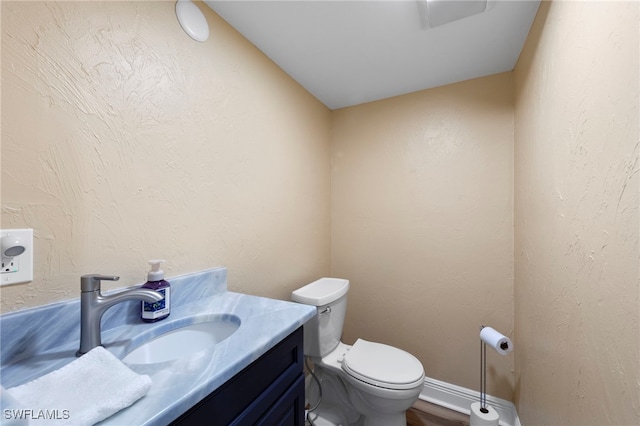 4938 Vincennes St Unit 3, Cape Coral, FL 33904 - half bathroom with vanity and wood finished floors