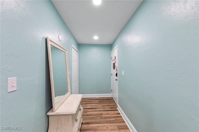 4938 Vincennes St Unit 3, Cape Coral, FL 33904 - hall with wood finished floors, recessed lighting, and a textured wall