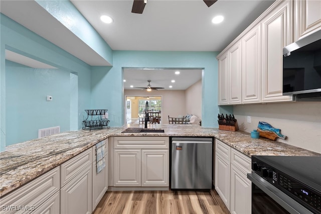 4938 Vincennes St Unit 3, Cape Coral, FL 33904 - kitchen with appliances with stainless steel finishes, a ceiling fan, recessed lighting, light wood-style floors, and light stone counters